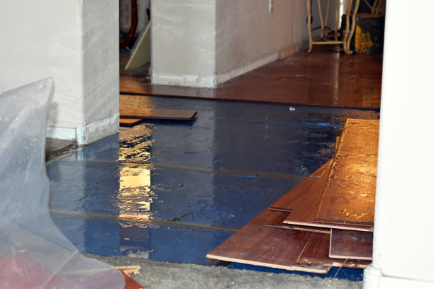 Professional Flood Damage Restoration technician working in Charlestown, MA